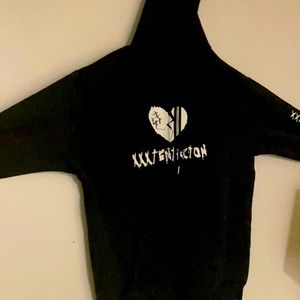 This is a sweater signed by XXXTENTACION
